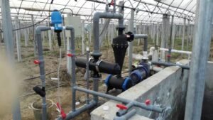 An engineer cleaning an offline filter