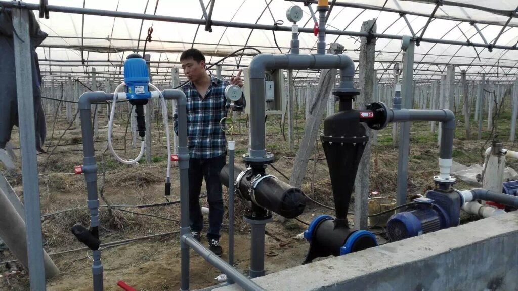 An engineer cleaning an offline filter